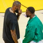 Los Angeles Lakers LeBron James 23 talks with former NBA, Basketball Herren, USA star Dwyane Wade during an NBA basketball game against the Portland Trail Blazers at Crypto.com Arena, Sunday, Nov. 12, 2023, in Los Angeles