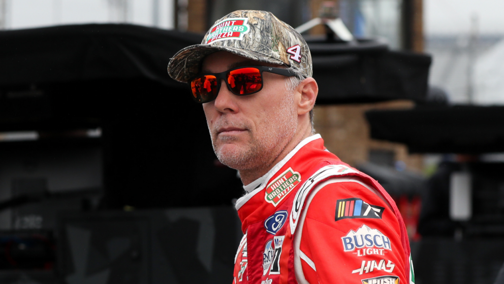 Apr 29, 2023; Dover, Delaware, USA; NASCAR Cup Series driver Kevin Harvick (right) talks with his crew chief Rodney Childers (left) on pit road during practice and qualifying for the Wurth 400 at Dover Motor Speedway. Mandatory Credit: Matthew OHaren-Imagn Images