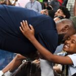 USA forward Lebron James (6) greets his daughter Zhuri James after the third quarter against Canada for the USA Basketball Showcase at T-Mobile Arena
