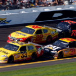 Feb 19, 2011; Daytona Beach, FL, USA; NASCAR Sprint Cup Series drivers Clint Bowyer leads Kurt Busch (22) , Jeff Burton (31) and Regan Smith (78) during the Daytona 500 at Daytona International Speedway. Mandatory Credit: Jerry Lai-Imagn Images