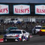 Busch Light Chevrolet driver Ross Chastain (1) leads a group of cars throught turn 16 during the NASCAR Cup Series EchoPark Automotive Grand Prix at Circuit of the Americas on Sunday, March 2, 2025 in Austin.