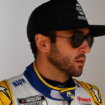 Feb 16, 2025; Daytona Beach, Florida, USA; NASCAR Cup Series driver Chase Elliott (9) walks to the drivers meeting before the Daytona 500 at Daytona International Speedway. Mandatory Credit: Peter Casey-Imagn Images