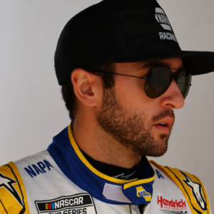 Feb 16, 2025; Daytona Beach, Florida, USA; NASCAR Cup Series driver Chase Elliott (9) walks to the drivers meeting before the Daytona 500 at Daytona International Speedway. Mandatory Credit: Peter Casey-Imagn Images