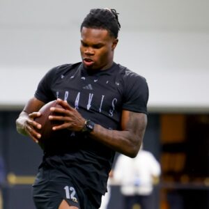Colorado Buffaloes wide receiver Travis Hunter (12) catches a pass at the University of Colorado NFL Showcase at the CU Indoor Practice Facility.