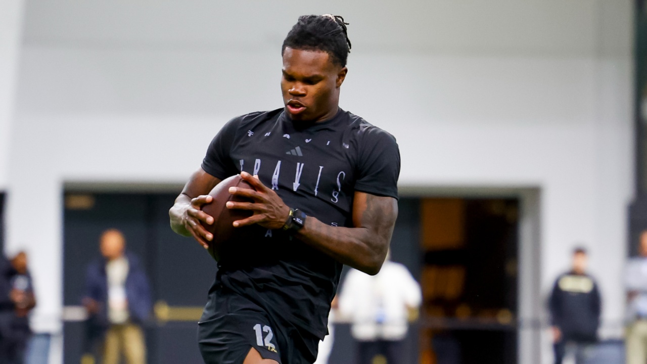 Colorado Buffaloes wide receiver Travis Hunter (12) catches a pass at the University of Colorado NFL Showcase at the CU Indoor Practice Facility.