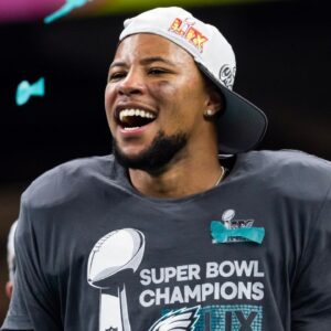 Philadelphia Eagles running back Saquon Barkley (26) celebrates after defeating the Kansas City Chiefs during Super Bowl LIX at Ceasars Superdome.