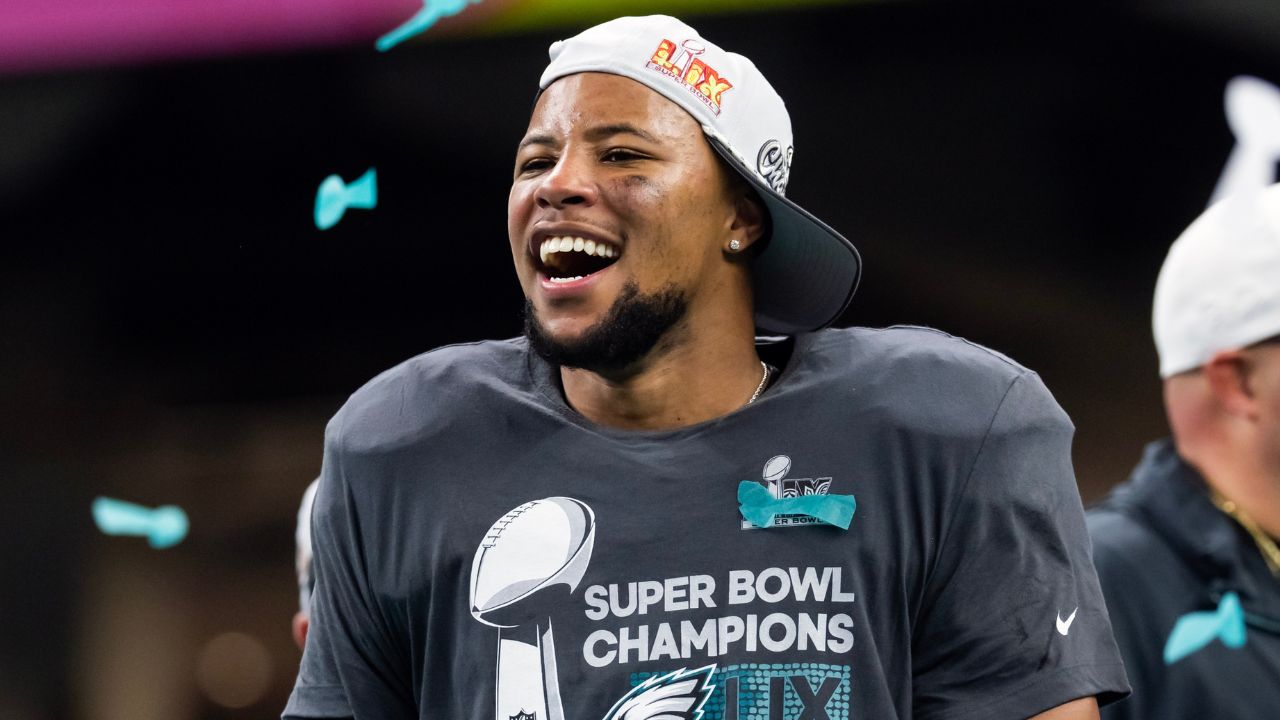 Philadelphia Eagles running back Saquon Barkley (26) celebrates after defeating the Kansas City Chiefs during Super Bowl LIX at Ceasars Superdome.