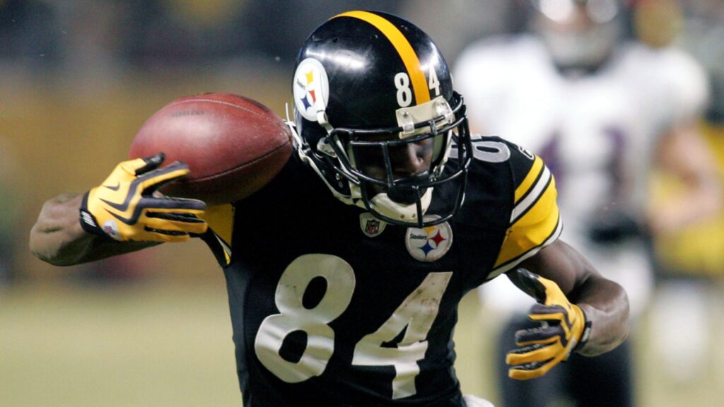January 15, 2011; Pittsburgh, PA, USA: Pittsburgh Steelers receiver Antonio Brown (84) catches a pass on third-and-19 over Baltimore Ravens cornerback Ladarius Webb (right) during the fourth quarter of the 2011 AFC divisional playoff game at Heinz Field. The Steelers won 31-24.