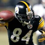 January 15, 2011; Pittsburgh, PA, USA: Pittsburgh Steelers receiver Antonio Brown (84) catches a pass on third-and-19 over Baltimore Ravens cornerback Ladarius Webb (right) during the fourth quarter of the 2011 AFC divisional playoff game at Heinz Field. The Steelers won 31-24.
