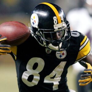 January 15, 2011; Pittsburgh, PA, USA: Pittsburgh Steelers receiver Antonio Brown (84) catches a pass on third-and-19 over Baltimore Ravens cornerback Ladarius Webb (right) during the fourth quarter of the 2011 AFC divisional playoff game at Heinz Field. The Steelers won 31-24.