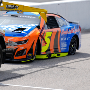 NASCAR Cup Series driver Kyle Larson (5) spins early in turn two and is brought in to the garage for work during the Goodyear 400 at Darlington Raceway.