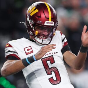 Jan 26, 2025; Philadelphia, PA, USA; Washington Commanders quarterback Jayden Daniels (5) celebrates after a play against the Philadelphia Eagles during the second half in the NFC Championship game at Lincoln Financial Field.