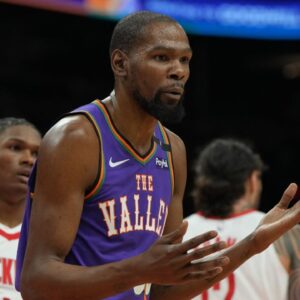 Phoenix Suns forward Kevin Durant (35) reacts after fouling a Houston Rockets player in the first half at Footprint Center