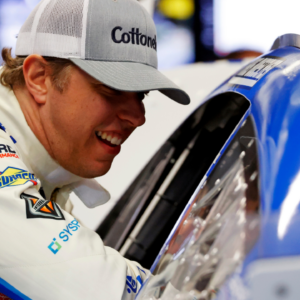 Feb 14, 2025; Daytona Beach, Florida, USA; NASCAR Cup Series driver Brad Keselowski (6) talks to NASCAR Cup Series driver Chris Buescher (17) during practice for the Daytona 500 at Daytona International Speedway. Mandatory Credit: Peter Casey-Imagn Images