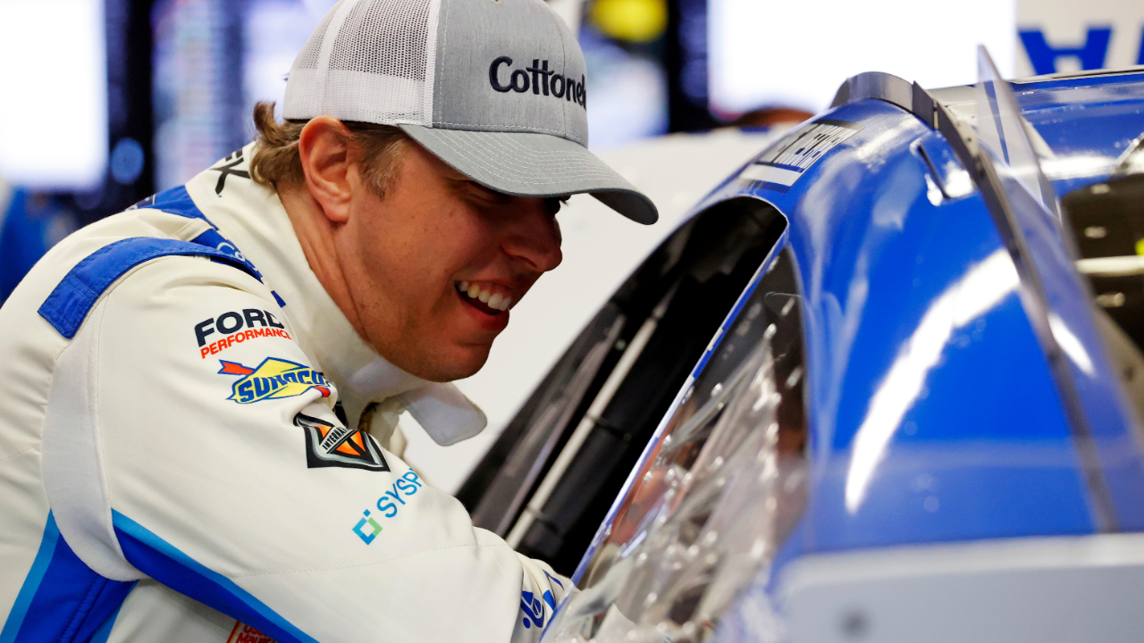 Feb 14, 2025; Daytona Beach, Florida, USA; NASCAR Cup Series driver Brad Keselowski (6) talks to NASCAR Cup Series driver Chris Buescher (17) during practice for the Daytona 500 at Daytona International Speedway. Mandatory Credit: Peter Casey-Imagn Images