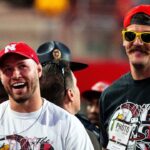 Bussin’ With The Boys’ Will Compton and Taylor Lewan stand on the sideline during the third quarter between the Nebraska Cornhuskers and the Colorado Buffaloes at Memorial Stadium.