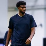 Apr 4, 2025; Boulder, CO, USA; Colorado Buffaloes quarterback Shedeur Sanders (2) runs drills at the University of Colorado NFL Showcase at the CU Indoor Practice Facility.