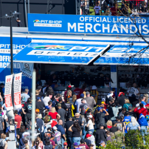 NASCAR Cup Series fans wait in line to buy official NASCAR merchandise during the Busch Light Clash at The Coliseum at Los Angeles Memorial Coliseum.