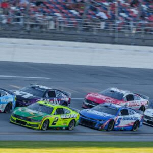 NASCAR Cup Series driver Austin Cindric (2) leads the pack into turn one at Talladega Superspeedway.