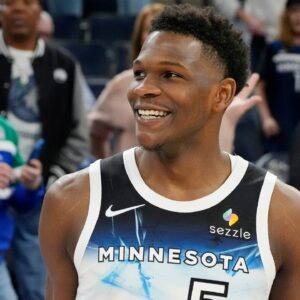 Minnesota Timberwolves guard Anthony Edwards (5) smiles after the game against the Brooklyn Nets at Target Center.