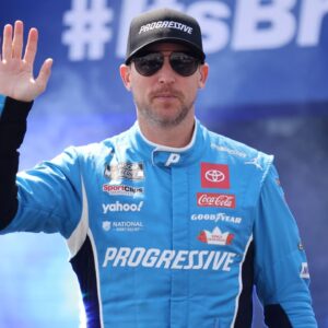 Apr 13, 2025; Bristol, Tennessee, USA; NASCAR Cup Series driver Denny Hamlin (11) during driver introductions for the NASCAR Food City 500 at Bristol Motor Speedway.