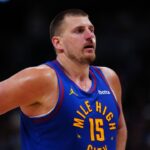 Denver Nuggets center Nikola Jokic (15) at the free throw line during overtime against the LA Clippers at Ball Arena.