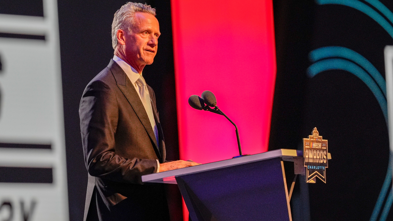 Nov 22, 2024; Charlotte, NC, USA; NASCAR President Steve Phelps speaks during the NASCAR Awards Banquet at Charlotte Convention Center. Mandatory Credit: Jim Dedmon-Imagn Images