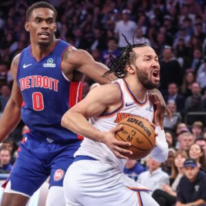 New York Knicks guard Jalen Brunson (11) drives past Detroit Pistons center Jalen Duren (0) in Game One of the First Round of the NBA Playoffs at Madison Square Garden