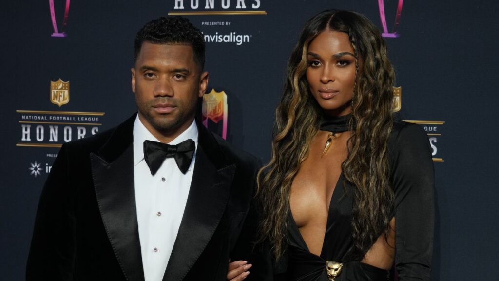 Russell Wilson and his wife Ciara appears on the red carpet prior to the NFL Honors awards presentation at YouTube Theater.