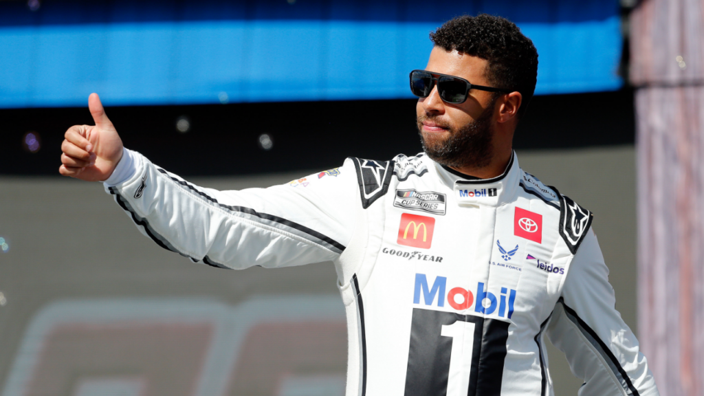 NASCAR Cup Series driver Bubba Wallace (23) walks out onto the stage for driver introductions before the EchoPark Automotive Grand Prix at Circuit of the Americas.