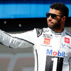 NASCAR Cup Series driver Bubba Wallace (23) walks out onto the stage for driver introductions before the EchoPark Automotive Grand Prix at Circuit of the Americas.