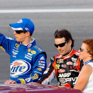 Brad Keselowski (2) and Jeff Gordon (24) during driver introductions before the Quaker State 400 at Kentucky Speedway.