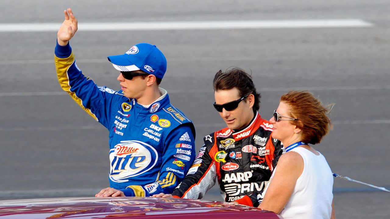 Brad Keselowski (2) and Jeff Gordon (24) during driver introductions before the Quaker State 400 at Kentucky Speedway.