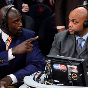 TNT broadcaster Shaquille O'Neal (left) and Charles Barkley talk during the 2013 NBA All-Star slam dunk contest at the Toyota Center