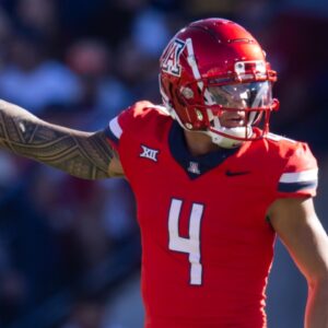 Nov 30, 2024; Tucson, Arizona, USA; Arizona Wildcats wide receiver Tetairoa McMillan (4) against the Arizona State Sun Devils during the Territorial Cup at Arizona Stadium.