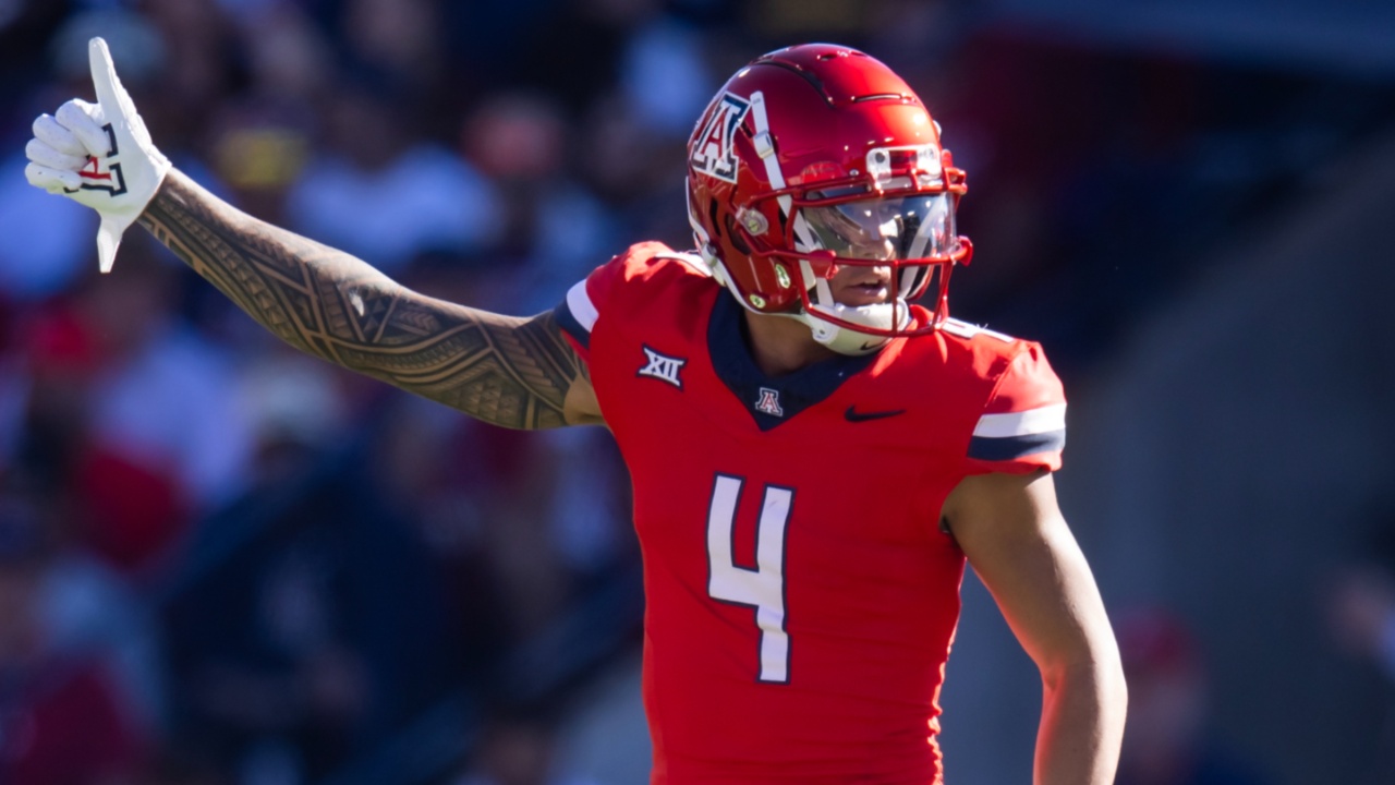 Nov 30, 2024; Tucson, Arizona, USA; Arizona Wildcats wide receiver Tetairoa McMillan (4) against the Arizona State Sun Devils during the Territorial Cup at Arizona Stadium.