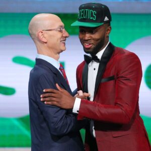 Jaylen Brown (California) greets NBA commissioner Adam Silver after being selected as the number three overall pick to the Boston Celtics in the first round of the 2016 NBA Draft at Barclays Center.