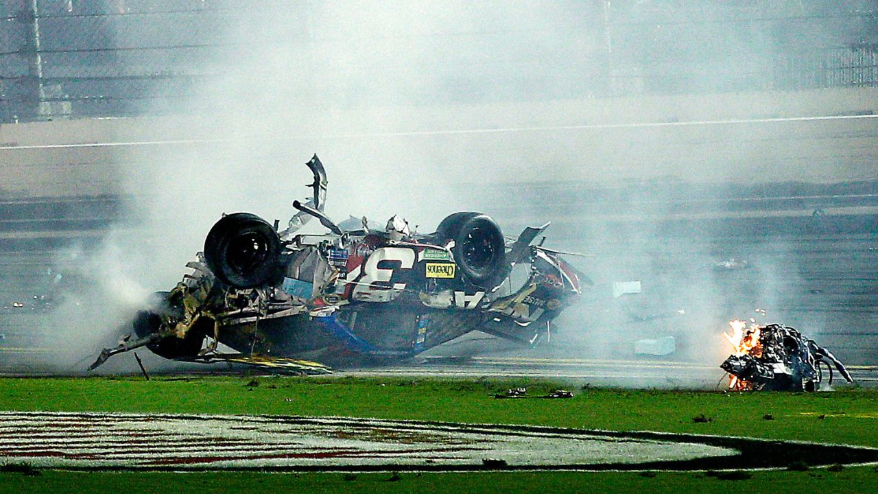 Parts off of NASCAR Sprint Cup Series driver Austin Dillon (3) car tumble through the infield following a crash at the finish to the Coke Zero 400 at Daytona International Speedway. NASCAR Sprint Cup Series driver Dale Earnhardt Jr. (not pictured) won.