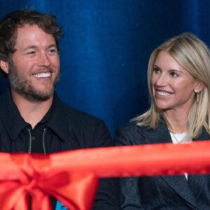 Mathew and Kelly Stafford share a laugh during speeches for the ribbon cutting of the Kelly and Matthew Stafford and Friends Education Center at the S.A.Y Detroit Play Center in Detroit on Monday, April 1, 2024.