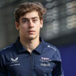Franco Colapinto of Argentina and the Alpine F1 team walks in the paddock during practice ahead of the F1 Grand Prix of Australia at Albert Park