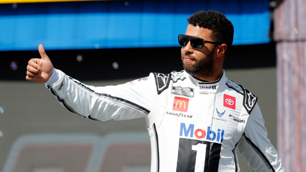 NASCAR Cup Series driver Bubba Wallace (23) walks out onto the stage for driver introductions before the EchoPark Automotive Grand Prix at Circuit of the Americas.