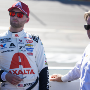 Nov 10, 2024; Avondale, Arizona, USA; NASCAR Cup Series driver William Byron (left) with Jeff Gordon during the NASCAR Cup Series Championship race at Phoenix Raceway. Mandatory Credit: Mark J. Rebilas-Imagn Images
