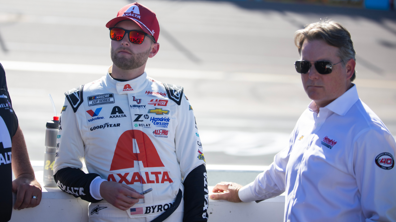 Nov 10, 2024; Avondale, Arizona, USA; NASCAR Cup Series driver William Byron (left) with Jeff Gordon during the NASCAR Cup Series Championship race at Phoenix Raceway. Mandatory Credit: Mark J. Rebilas-Imagn Images
