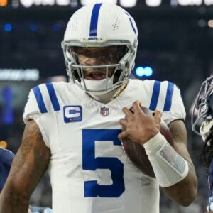 Dec 22, 2024; Indianapolis, Indiana, USA; Indianapolis Colts quarterback Anthony Richardson (5) rushes for a touchdown during a game against the Tennessee Titans at Lucas Oil Stadium.