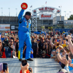 Apr 13, 2025; Las Vegas, NV, USA; NHRA top fuel driver Tony Stewart celebrates after winning the Four Wide Nationals at The Strip at Las Vegas Motor Speedway. The win is the first of Stewarts professional drag racing career. Mandatory Credit: Mark J. Rebilas-Imagn Images