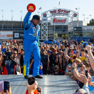 Apr 13, 2025; Las Vegas, NV, USA; NHRA top fuel driver Tony Stewart celebrates after winning the Four Wide Nationals at The Strip at Las Vegas Motor Speedway. The win is the first of Stewarts professional drag racing career. Mandatory Credit: Mark J. Rebilas-Imagn Images