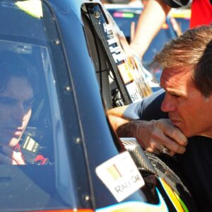 Jeff Gordon talks with former crew chief Ray Evernham (right) during practice for the Daytona 500 at Daytona International Speedway.