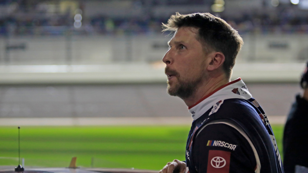 Denny Hamlin gets out of his car and checks out the screen during the Daytona 500 Pole Qualifying at Daytona International Speedway on Wednesday, Feb.12, 2025.