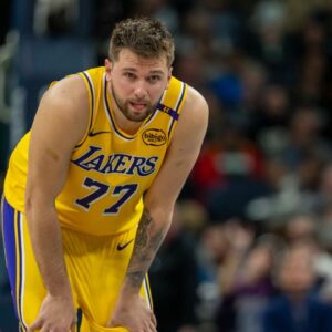 Apr 25, 2025; Minneapolis, Minnesota, USA; Los Angeles Lakers guard Luka Doncic (77) looks on against the Minnesota Timberwolves in the first half during game three of first round for the 2024 NBA Playoffs at Target Center. Mandatory Credit: Jesse Johnson-Imagn Images