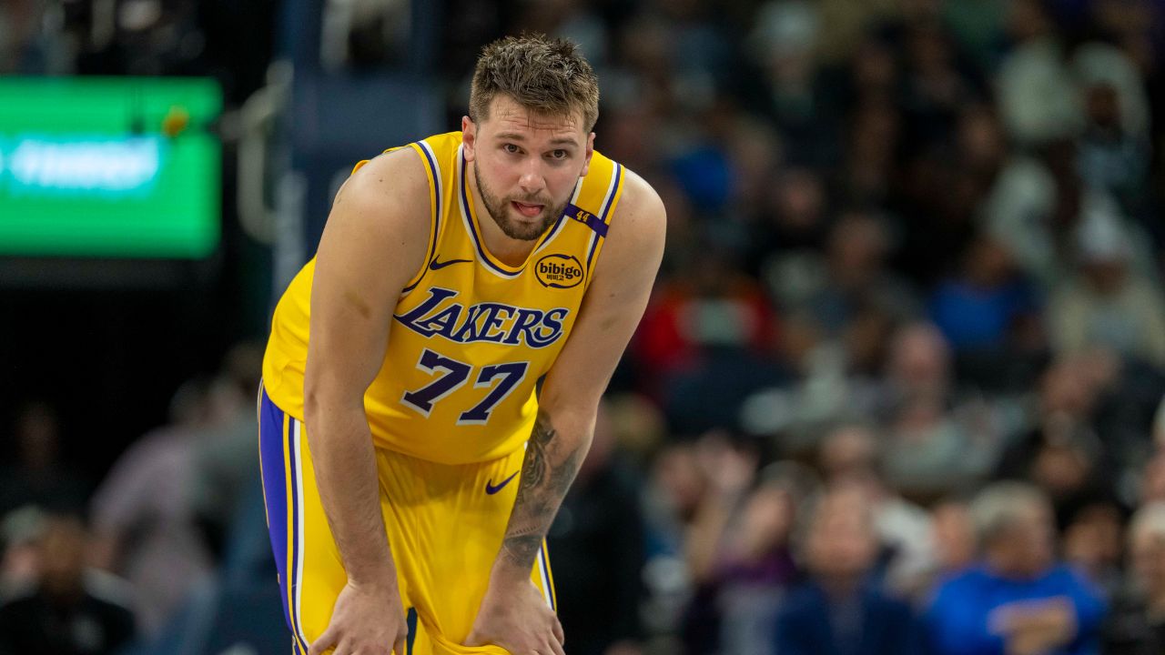 Apr 25, 2025; Minneapolis, Minnesota, USA; Los Angeles Lakers guard Luka Doncic (77) looks on against the Minnesota Timberwolves in the first half during game three of first round for the 2024 NBA Playoffs at Target Center. Mandatory Credit: Jesse Johnson-Imagn Images